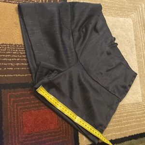 Black shorts front pocket , back sipper size 0/1